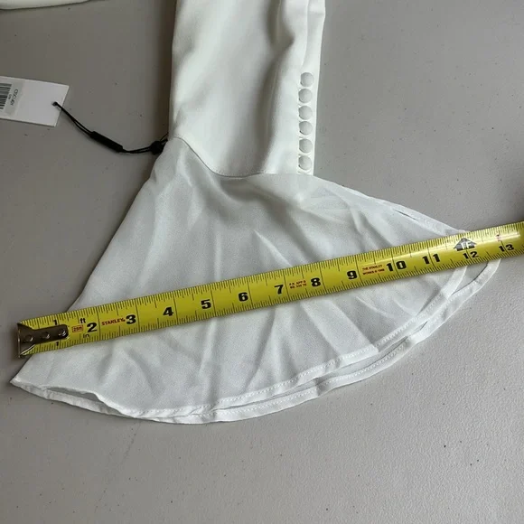 Elegant Calvin Klein White Dress with Flared Sleeves. - Picture 11 of 15